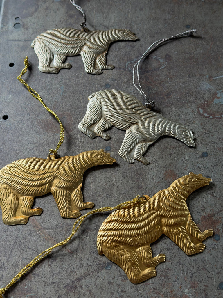 brass and nickel polar bears