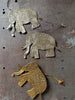 brass and nickel elephants