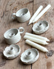 speckled candleholders