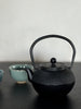 textured cast iron teapot