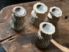 carved wooden candlesticks