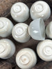 white ceramic bowls on timber surface