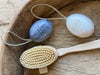 oval, pebble shaped soap with a rope moulded into the soap