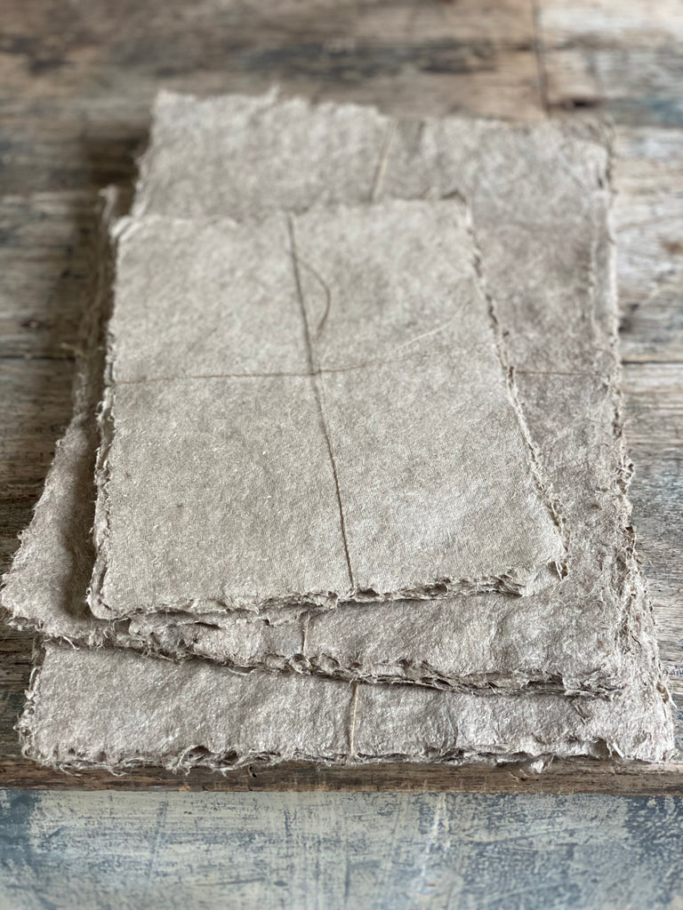 bundles of linen rag paper